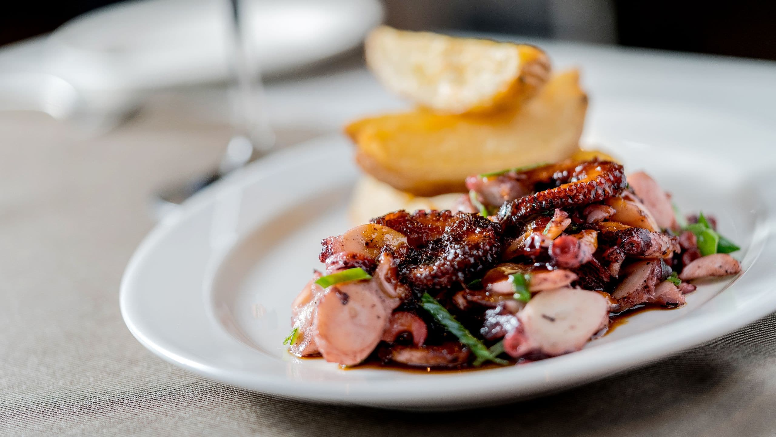 Hyatt Centric Las Condes Santiago Main Course Octopus with Garlic Fried Potatoes