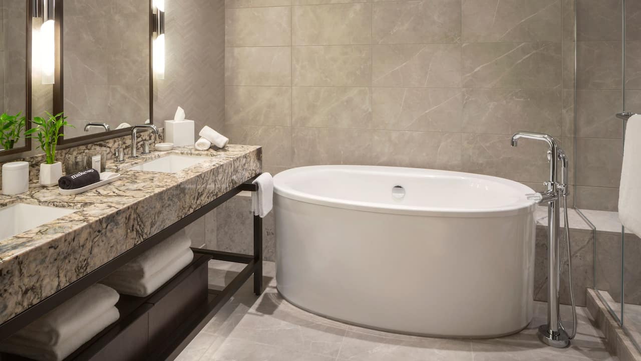 Grand Suite bathroom with double vanity and soaking tub