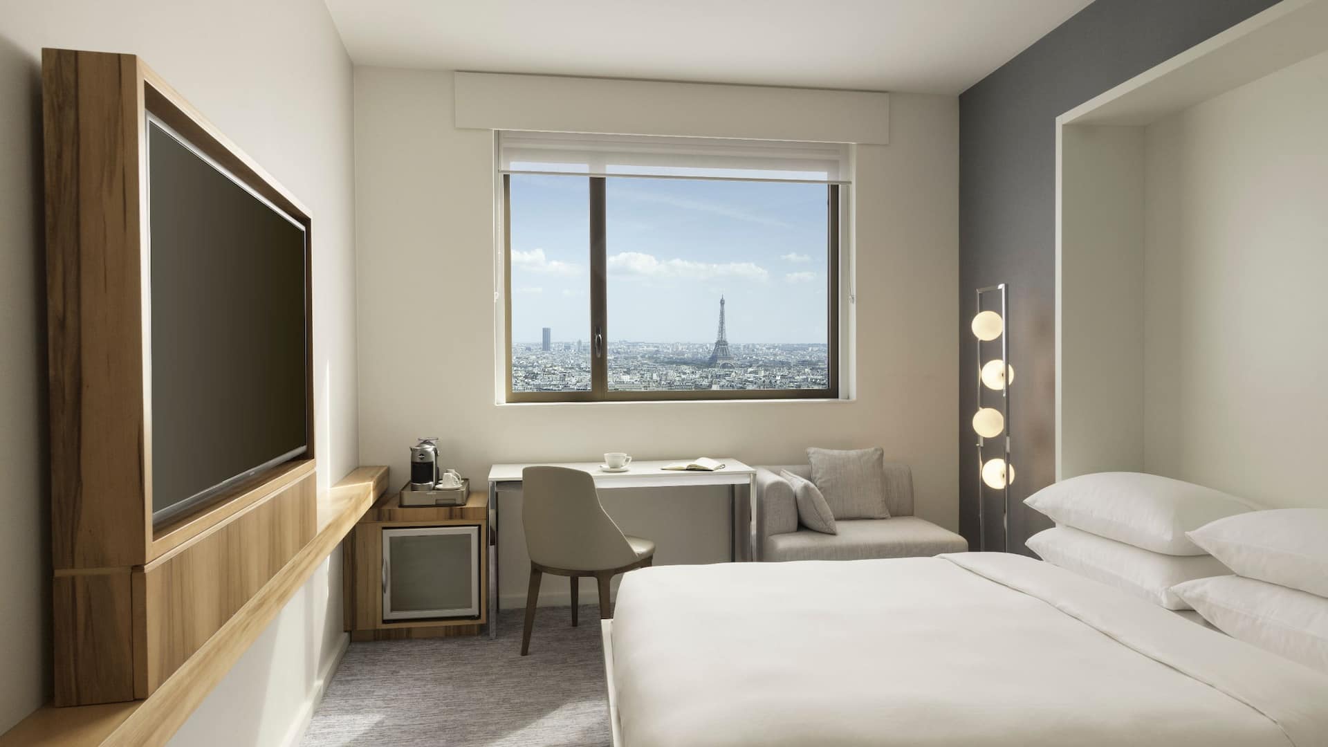 Hyatt Regency Paris Étoile Regency Suite Living Room Murphy Bed