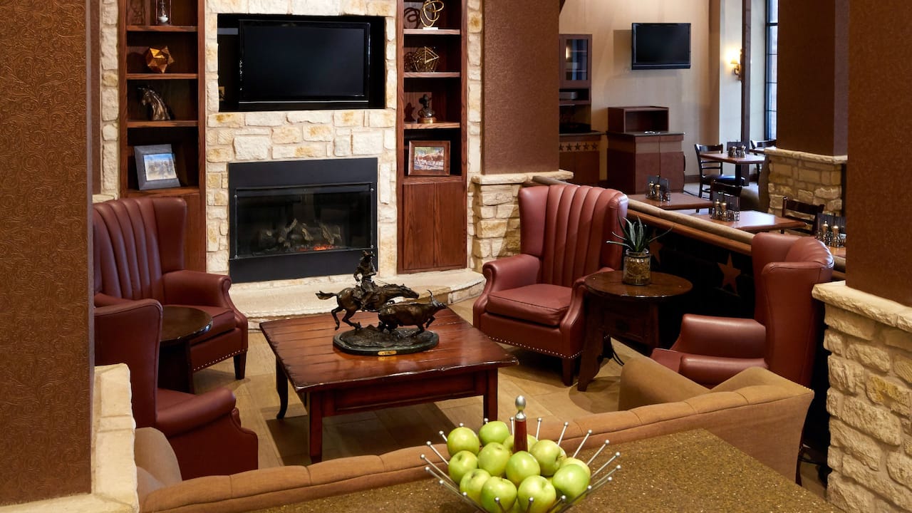 Lobby seating with television and fireplace