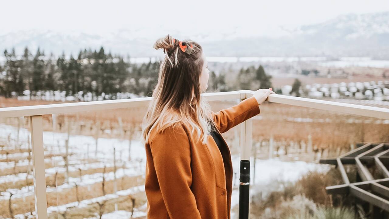 Woman Overlooking Balcony 