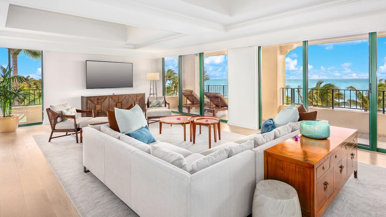 Alii Suite living room area with balcony and breathtaking ocean views at Grand Hyatt Kauai Resort and Spa