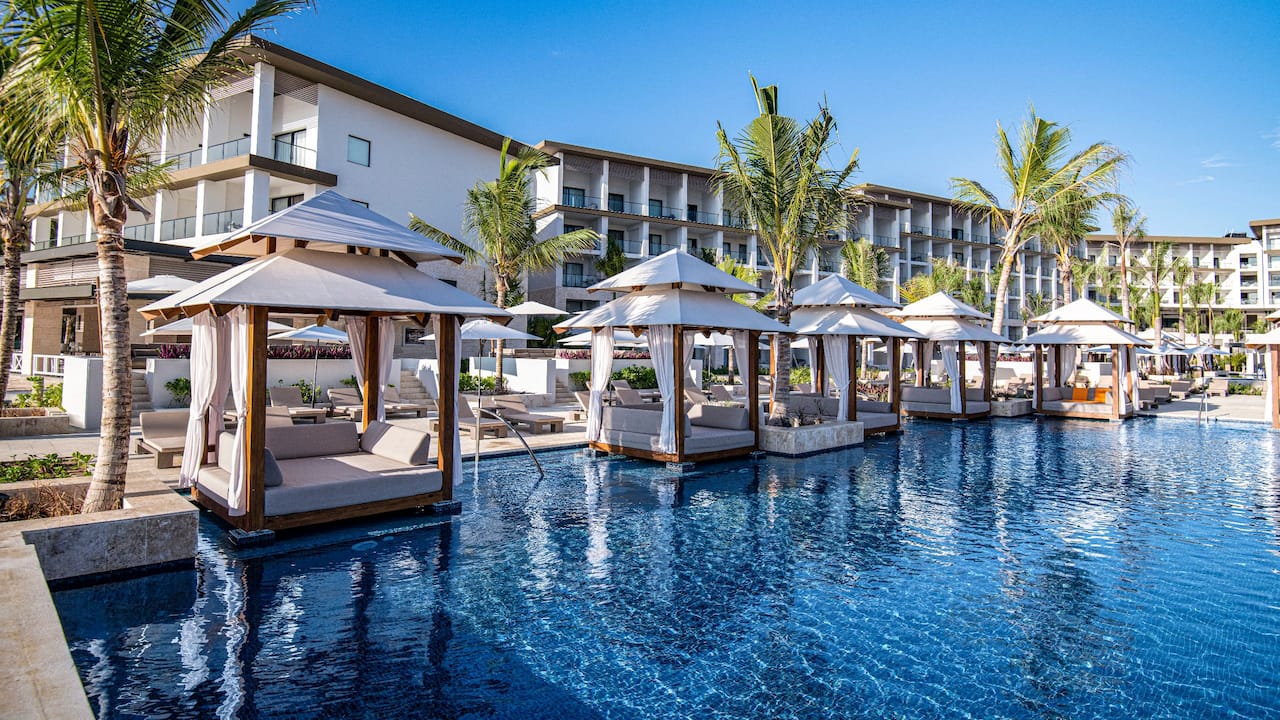 Cabanas on the main pool at Hyatt Zilara Cap Cana. 