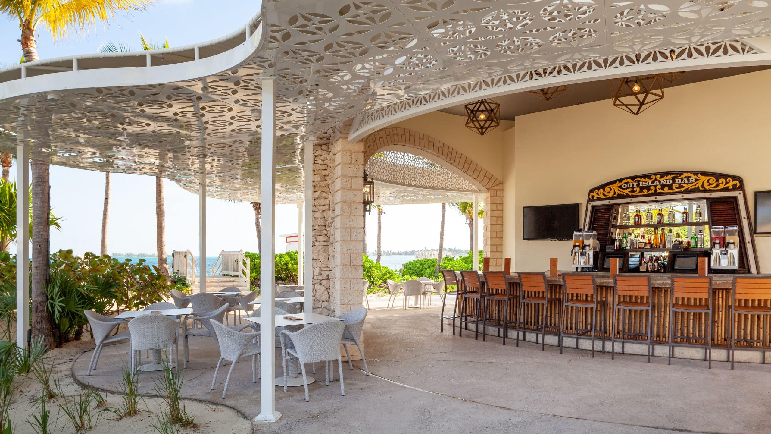 Open-air restaurant and bar at a beachfront Nassau Bahamas hotel