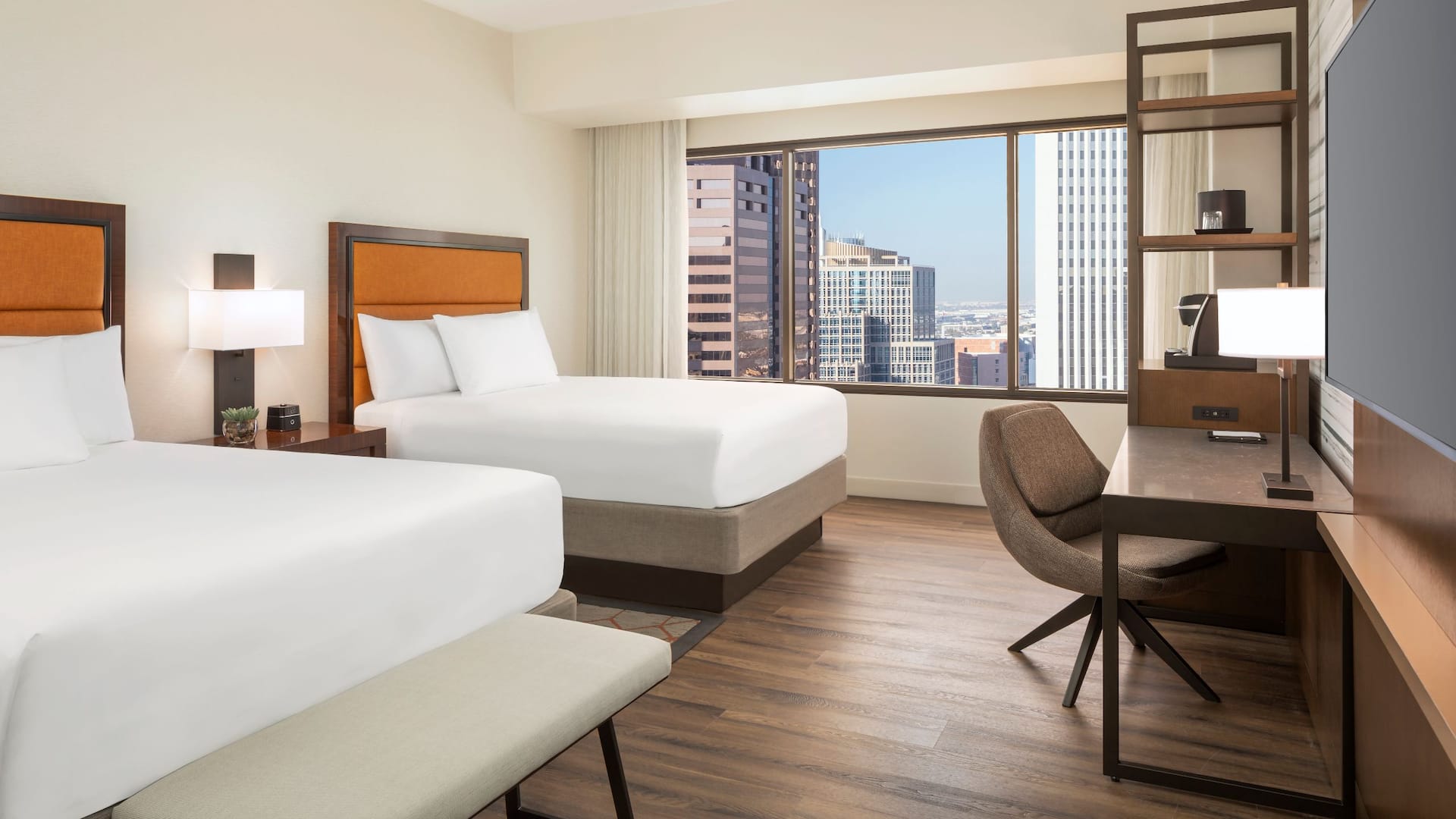 A two bed hotel room with a view of downtown Phoenix