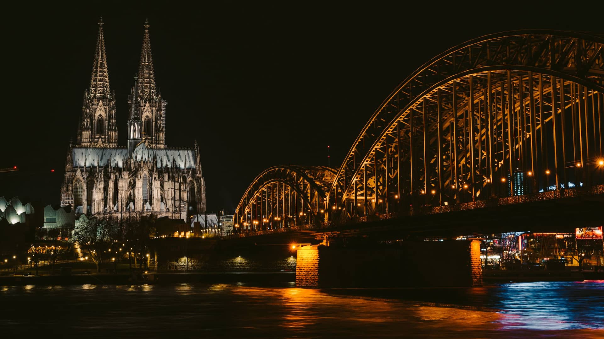 Cologne Cathedral Rhine and Hohenzollern Bridge with evening illumination near Hyatt Regency Cologne
