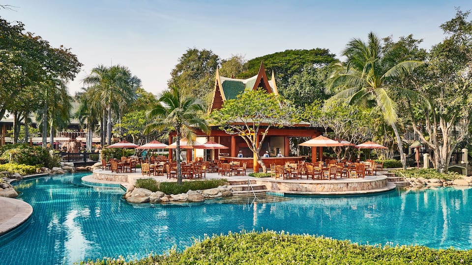 Exterior View of Restaurant Surrounded by Pool