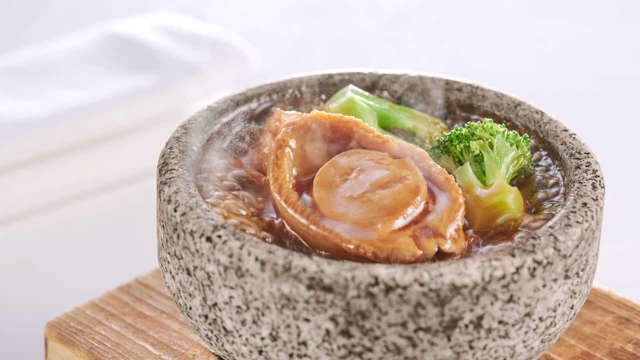 The Chinese Restaurant South African Abalone in stone bowl, layered bean curd