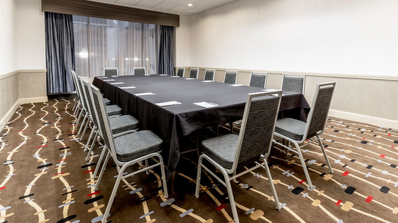 Director meeting space with chairs and tables at Hyatt Regency Tulsa Downtown.
