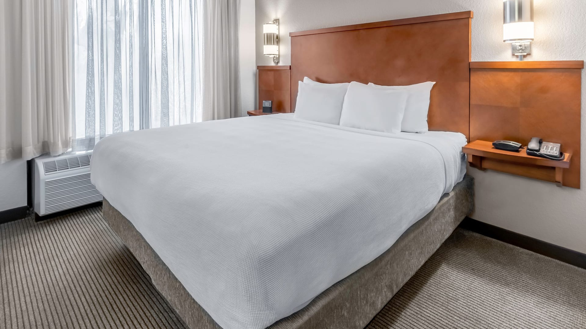 King bed at Hyatt Place Charlotte Airport/Billy Graham Airport.