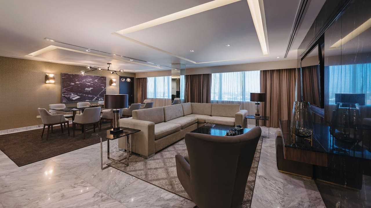 living room of the presidential suite in hotel merida