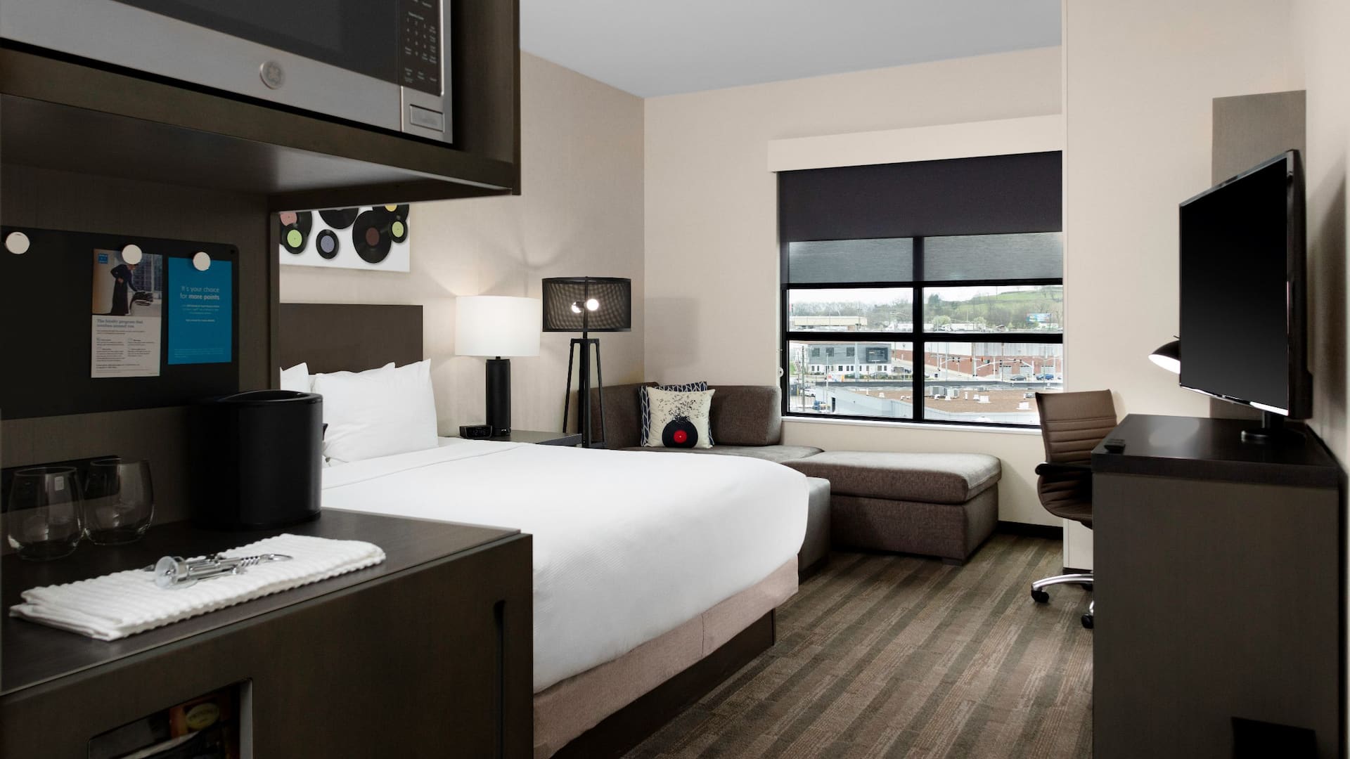 Nashville hotel room with king bed at Hyatt House Nashville / Downtown - SoBro