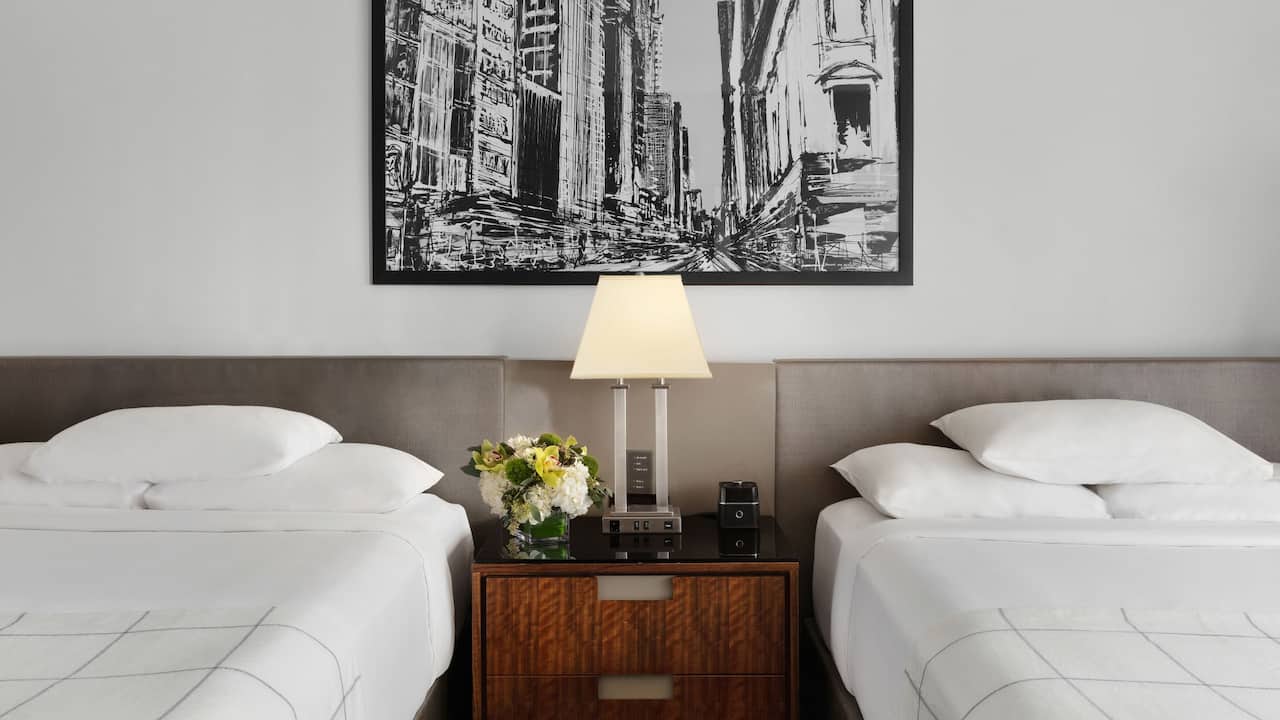 Two Double Bed guestroom with wall art at Hyatt Grand Central New York