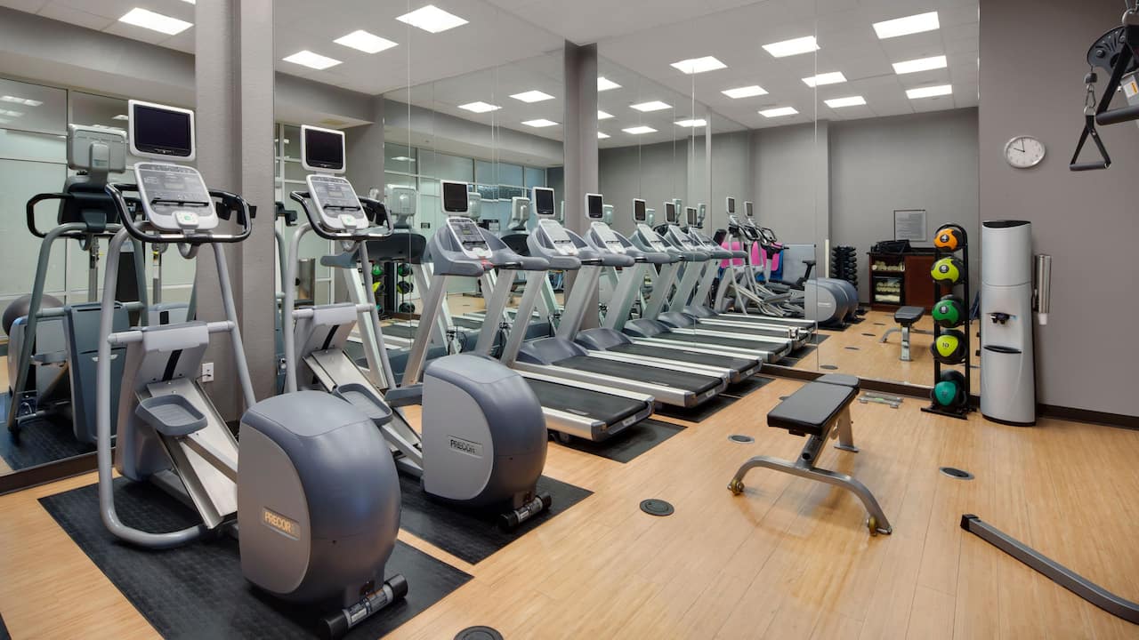 Fitness Center with cardio equipment and weights 