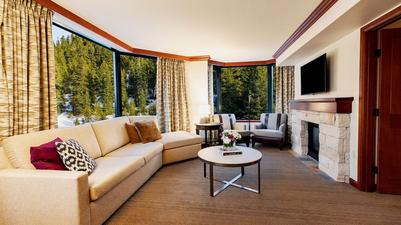 Deluxe Fireplace Suite Forest View Living Area