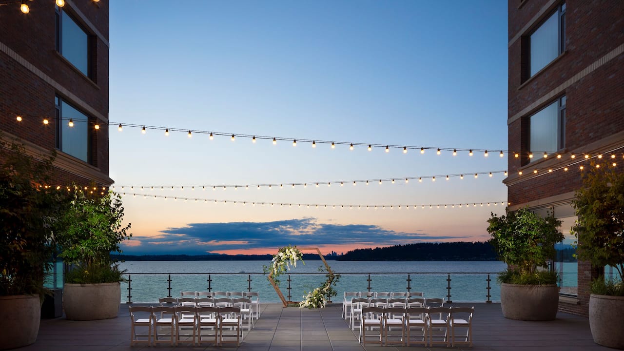 Outdoor wedding ceremony setup overlooking Lake Washington