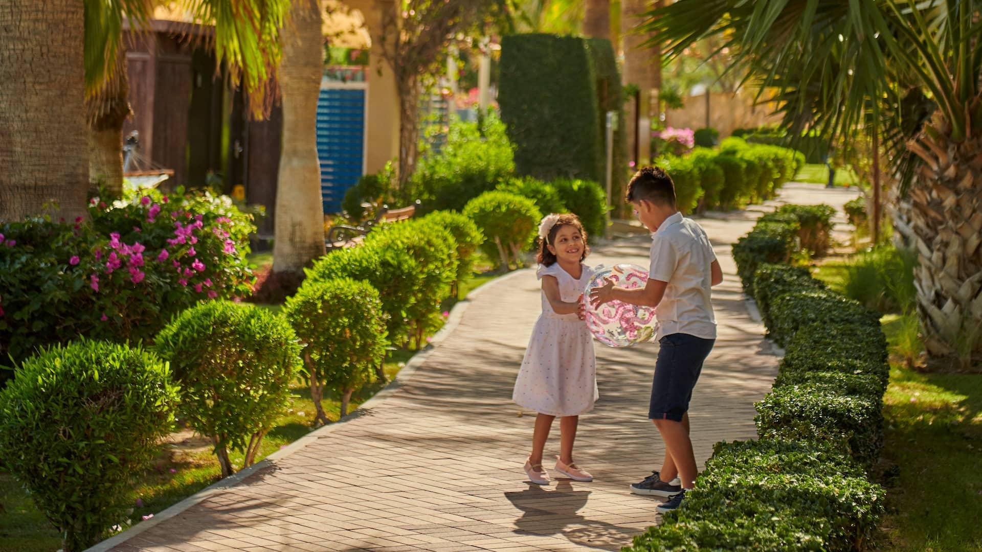 Grand Hyatt Doha Hotel & Villas Kids Playing At Hotel Garden