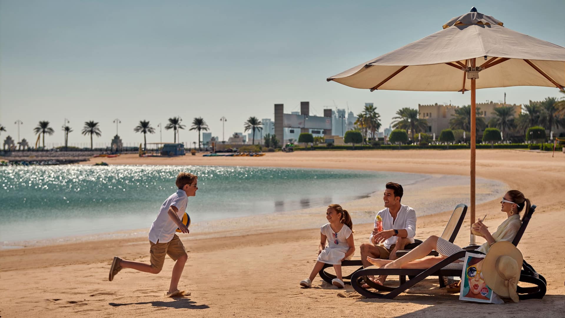Grand Hyatt Doha Hotel & Villas Family At Beach Enjoying
