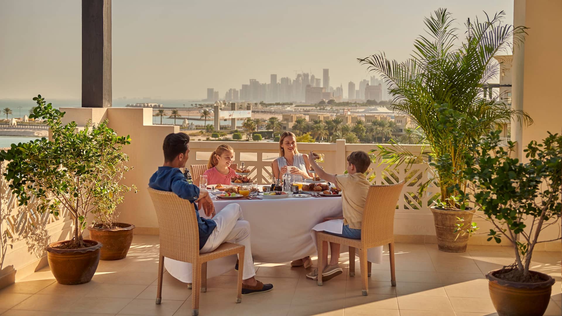 Grand Hyatt Doha Hotel & Villas Family Having Breakfast