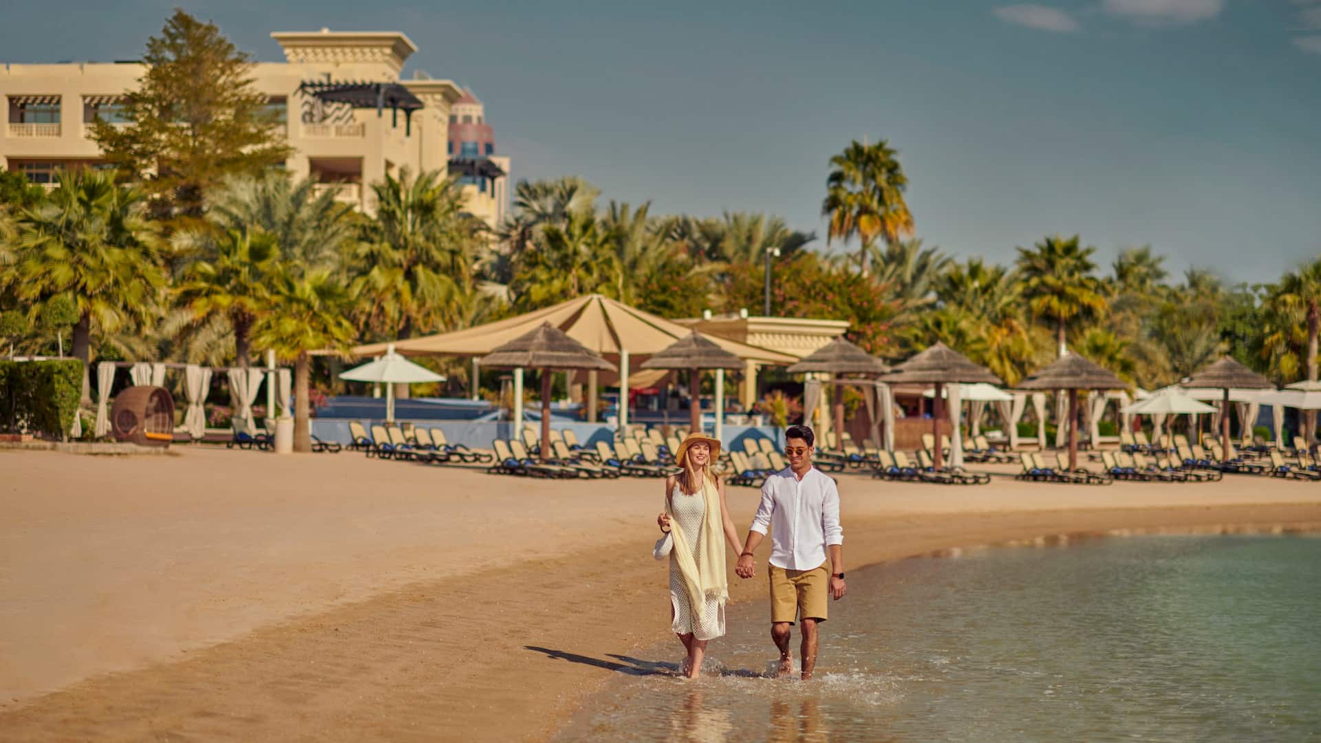 Grand Hyatt Doha Hotel & Villas Couple Walking At Beach