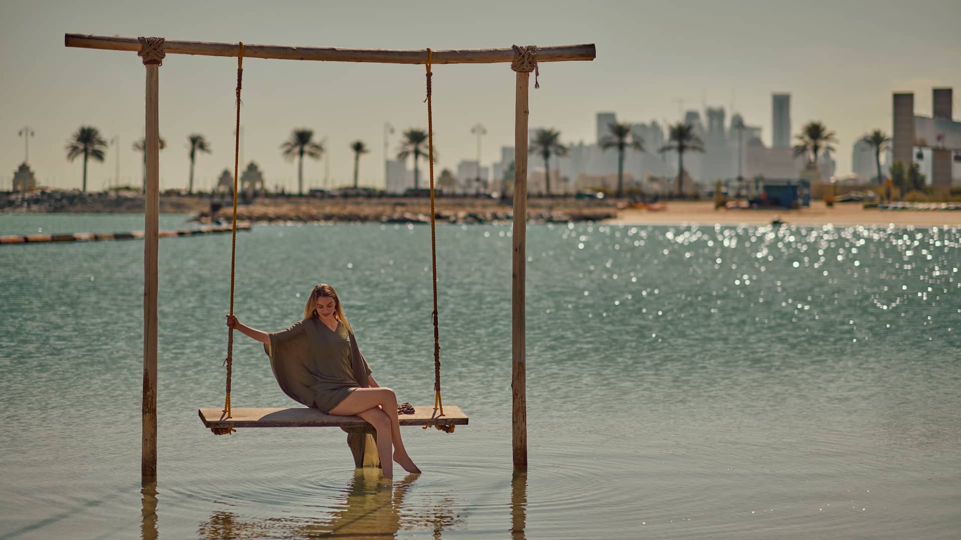 Grand Hyatt Doha Hotel & Villas Enjoying Beach Swing