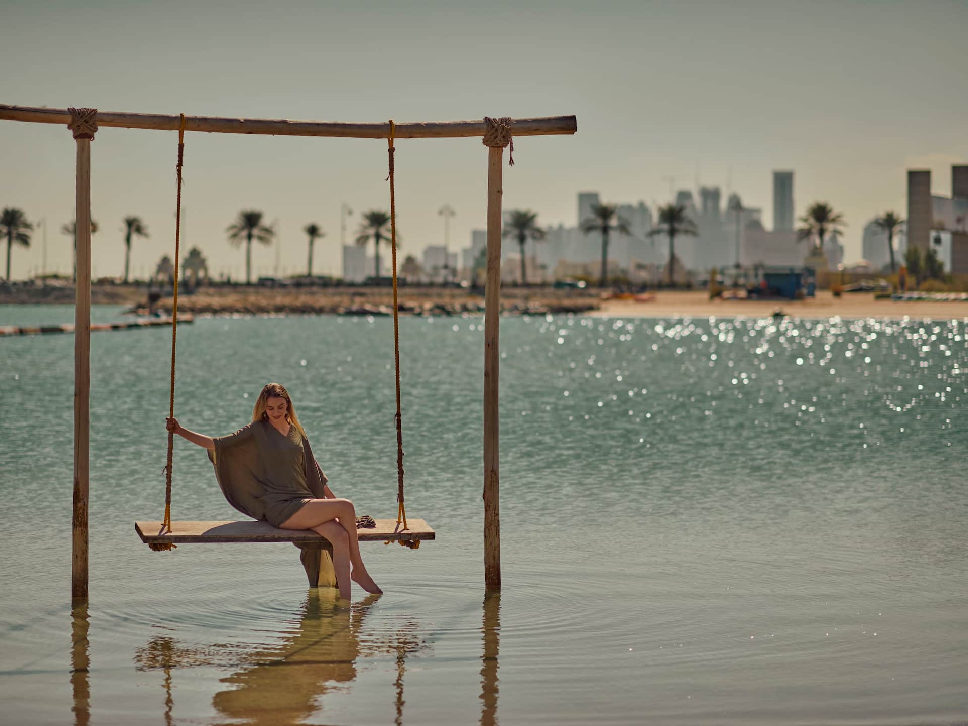 Grand Hyatt Doha Hotel & Villas Enjoying Beach Swing