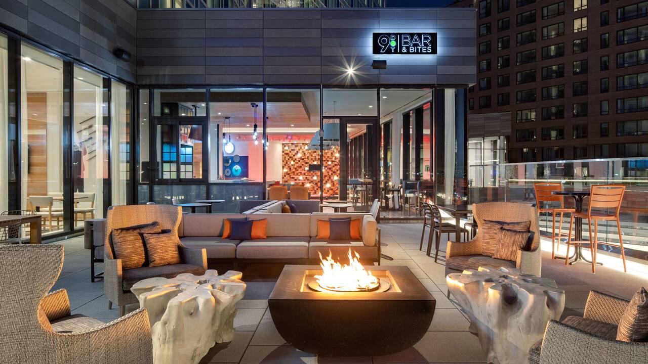Hotels near Boston Seaport District with Roof Deck Seating Outdoor Fire Pit at Hyatt Place Boston / Seaport