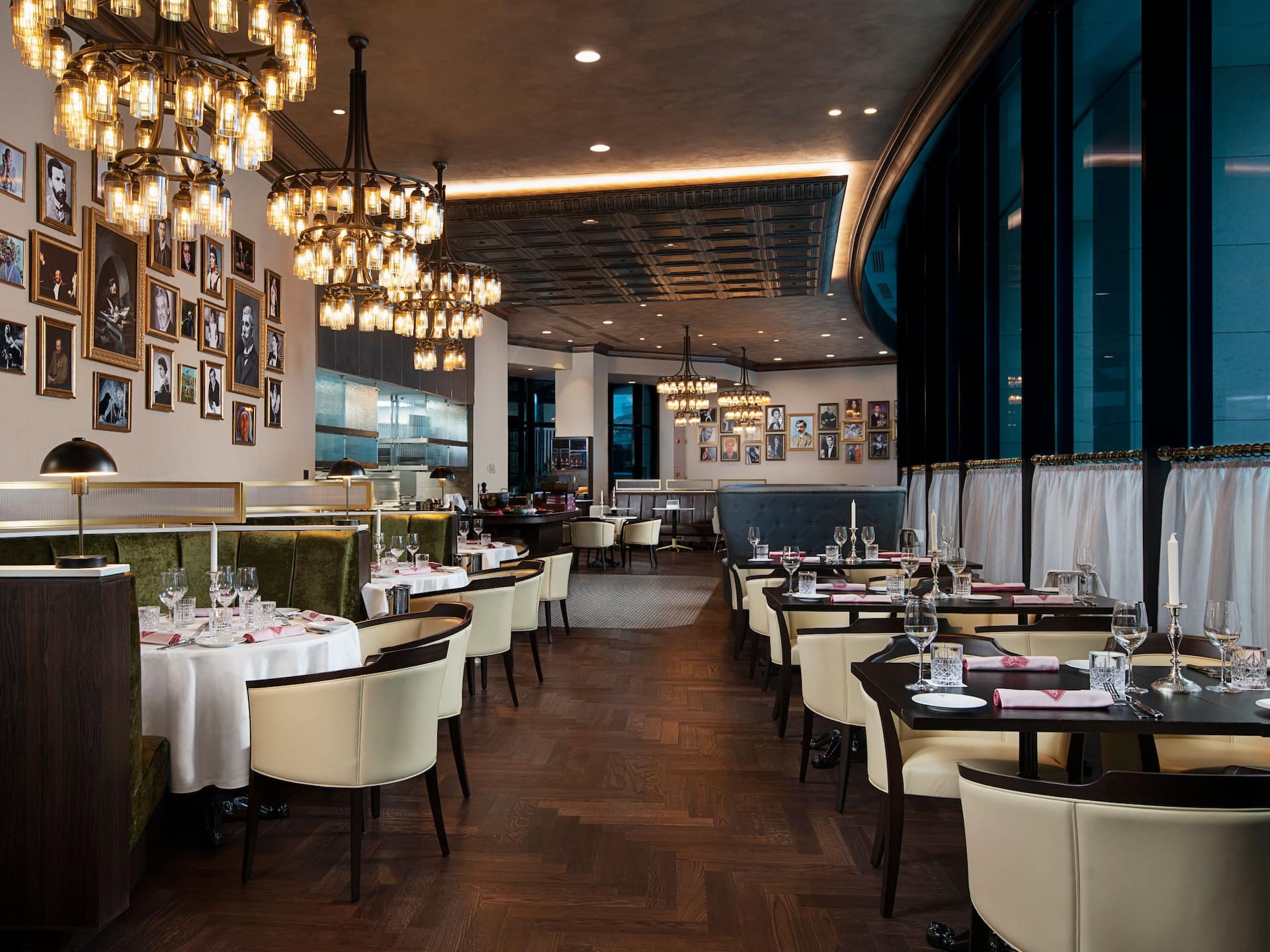 Fine dining setup at The Revolutionary Dining Room and Bar, Hyatt Regency Sofia’s signature restaurant, with gourmet dishes and elegant ambiance.