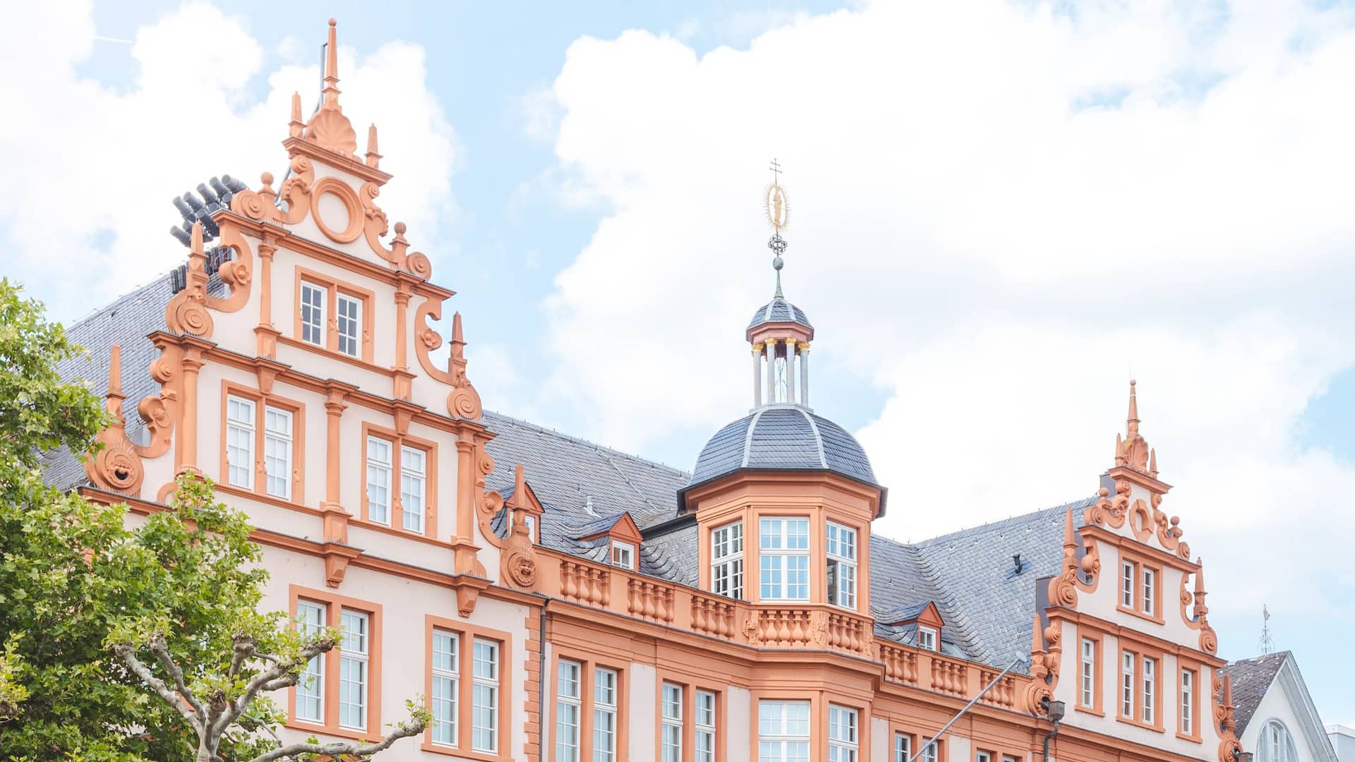 Cyclist rides through Mainzs old town near Hyatt Regency Mainz