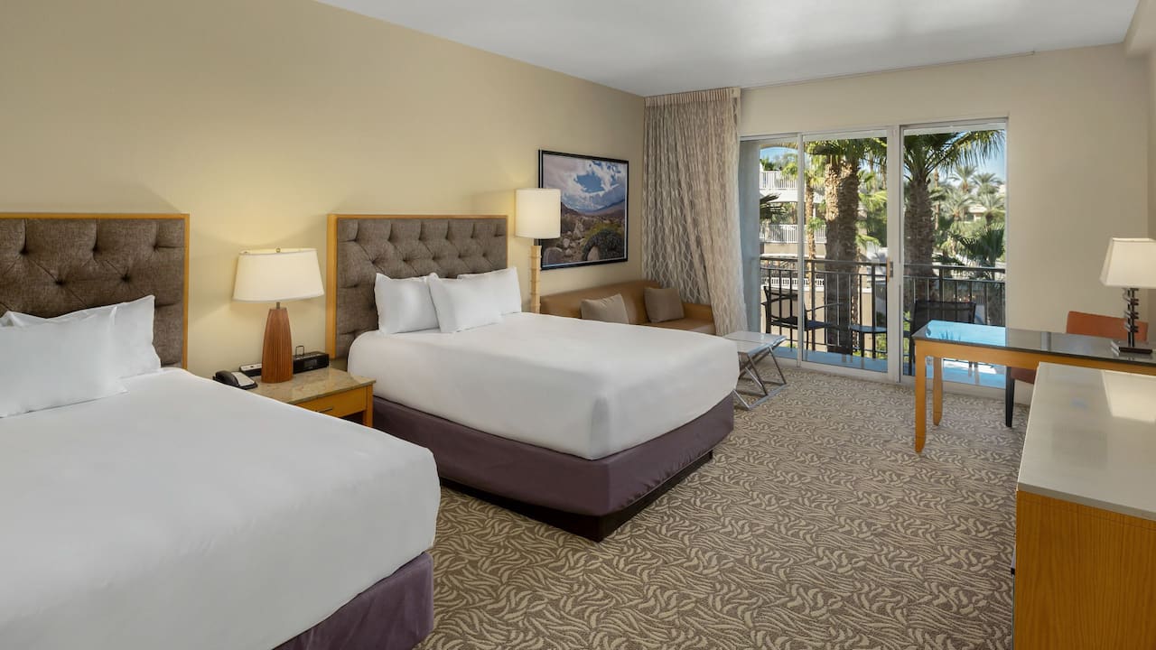 A spacious two queen bedroom with comfortable sofa bed at Hyatt Regency Indian Wells Resort & Spa