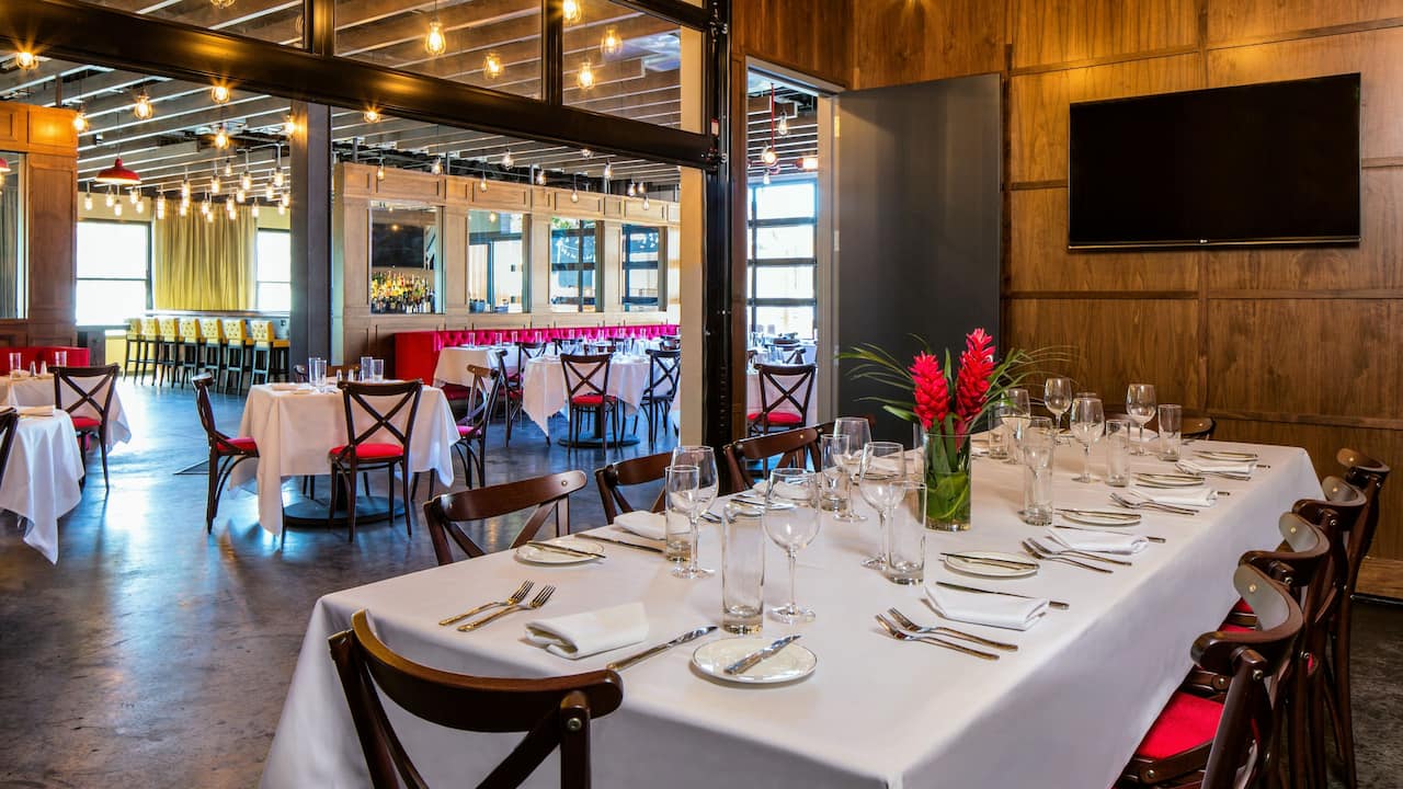 A spacious restaurant dining venue with a bar offered at Hotel Nyack near Terrytown
