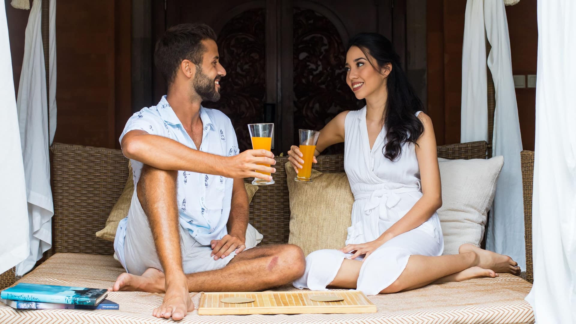 Grand Hyatt Bali Couple Lounging at Villa
