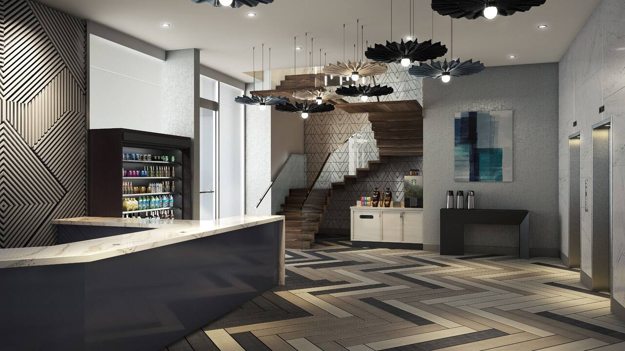 Lobby with front desk and coffee station 