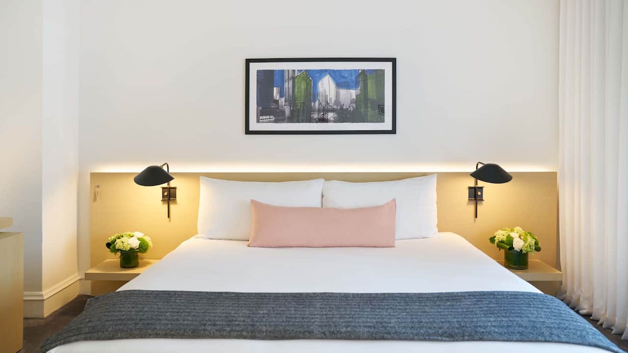 Junior Suite with king-sized bed with side table lamps