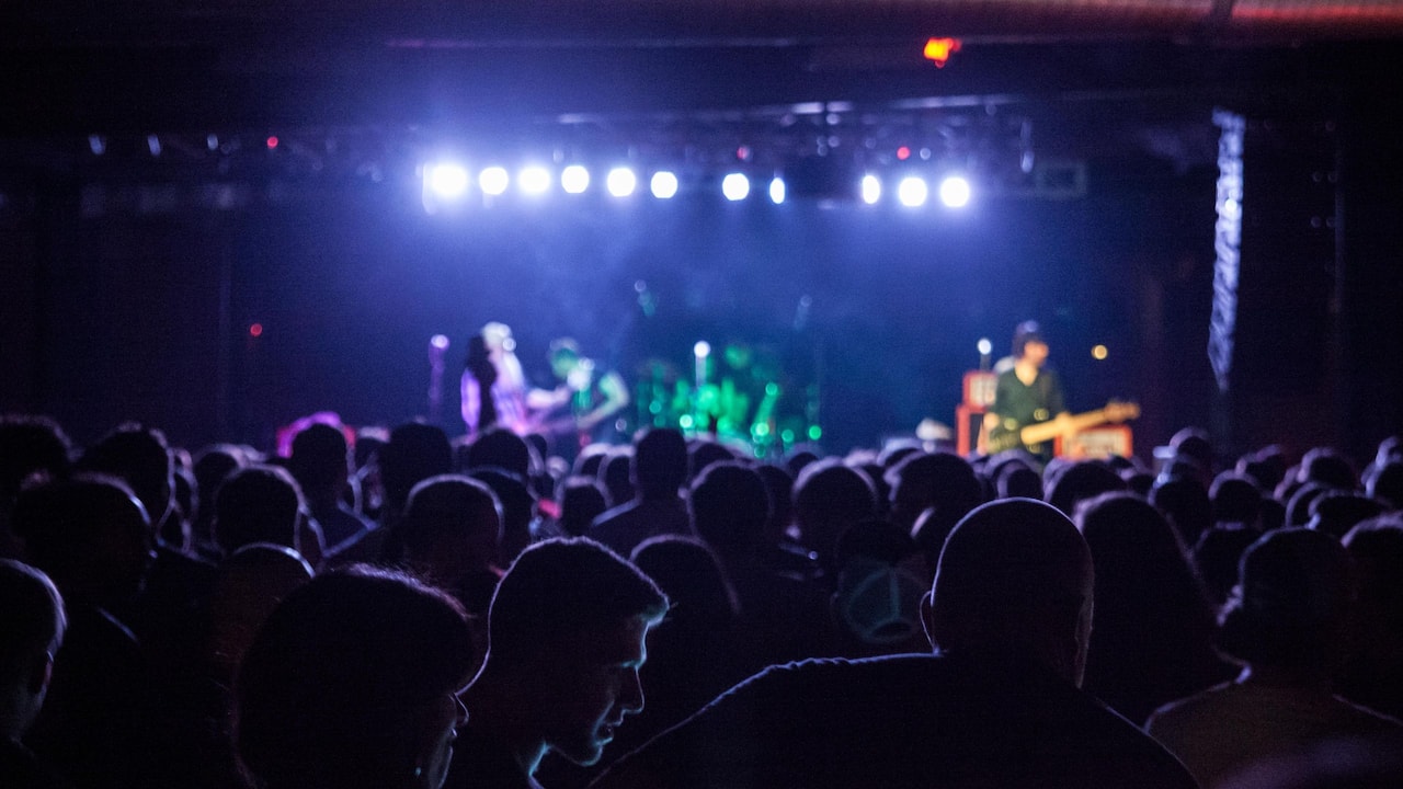 Fans watching a band live at a Nashville event venue