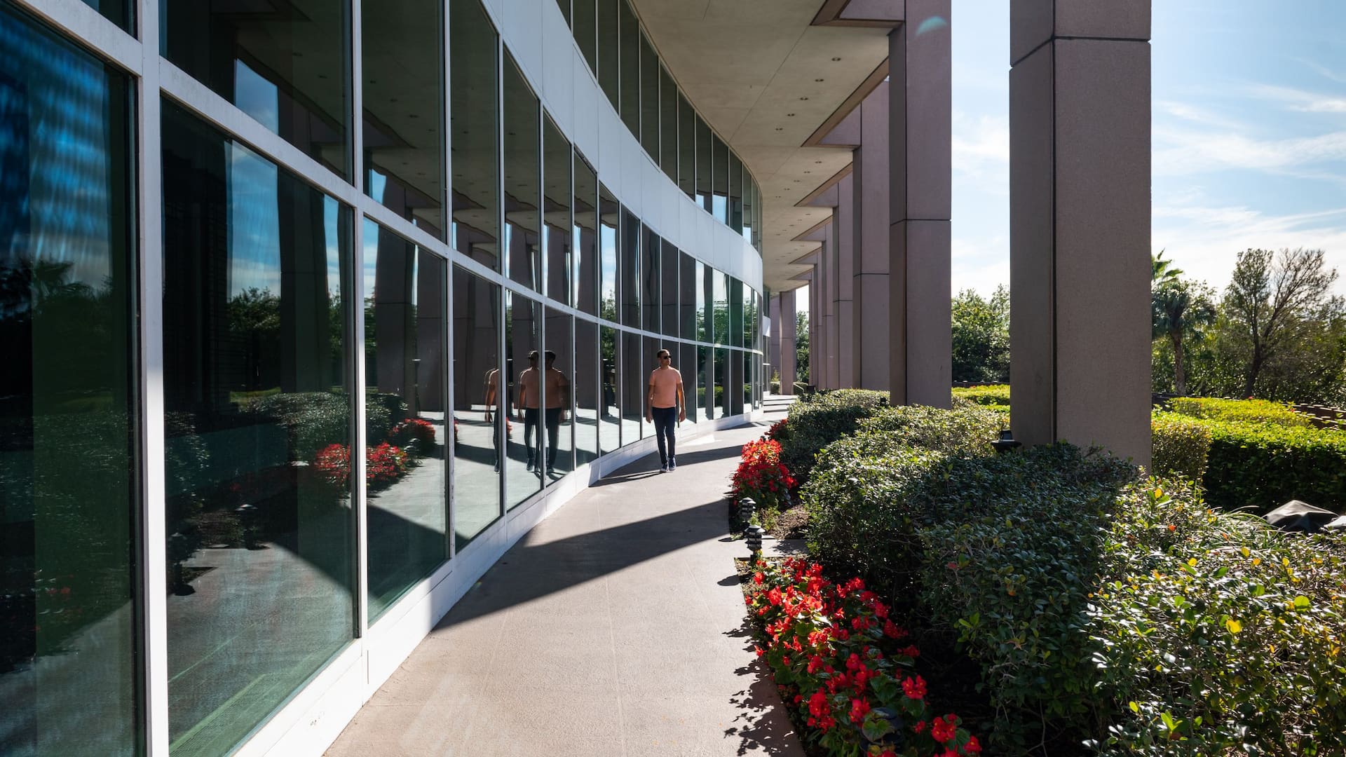 Grand Hyatt Tampa Bay Man Walking Outside Colonade