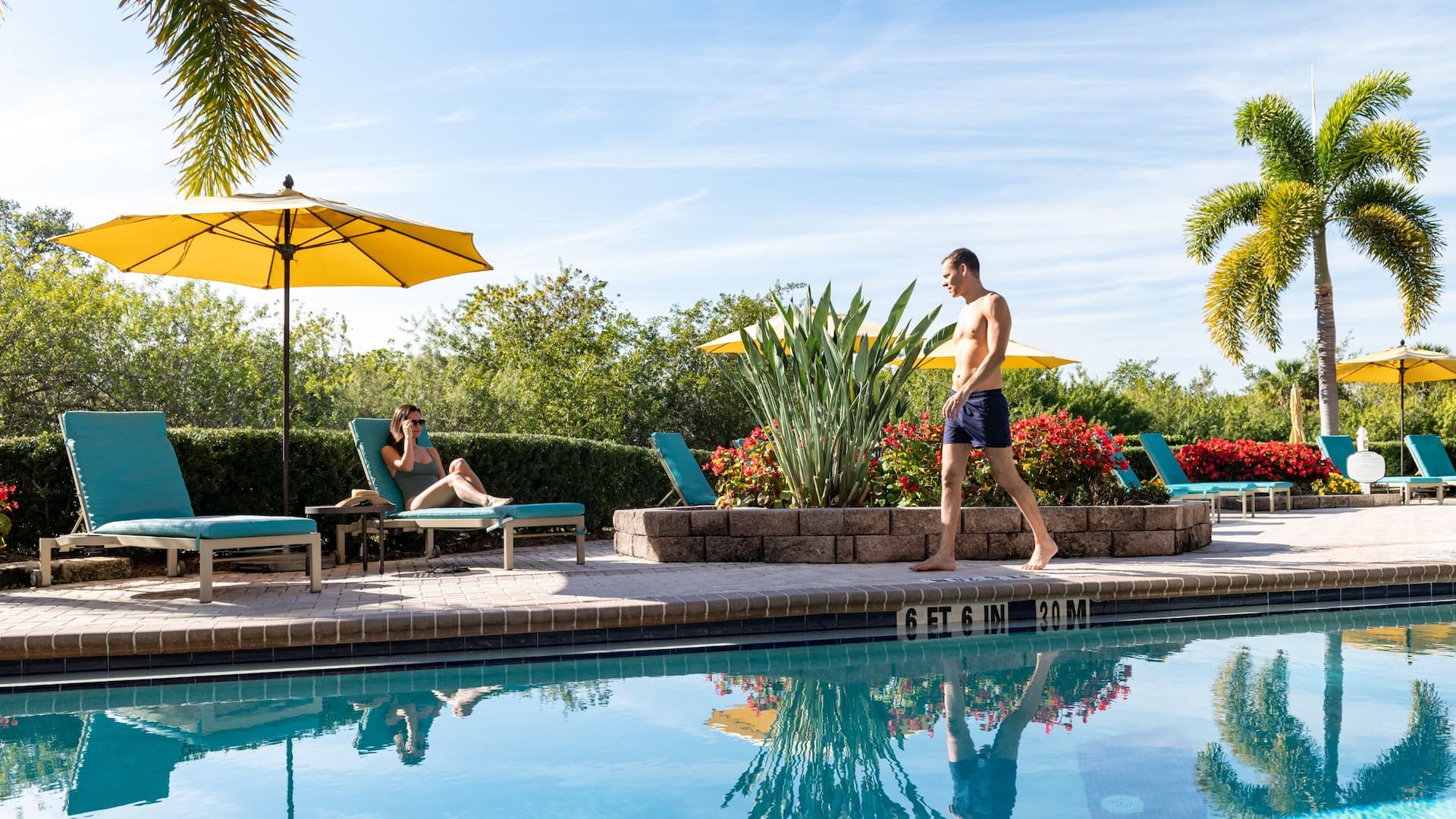 Grand Hyatt Tampa Bay Tower Pool Couple Man Walking