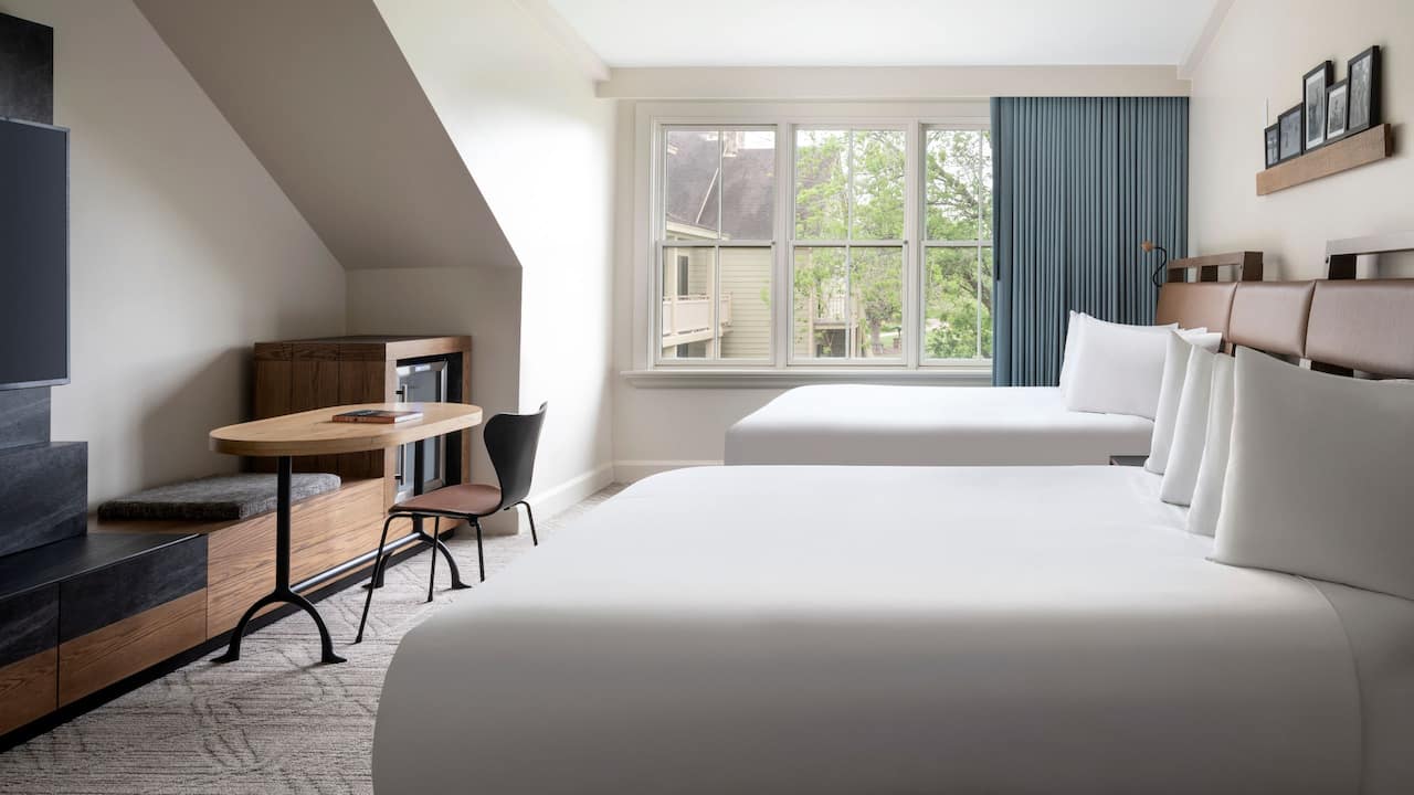 Two Queen Beds with work desk and panoramic outside view