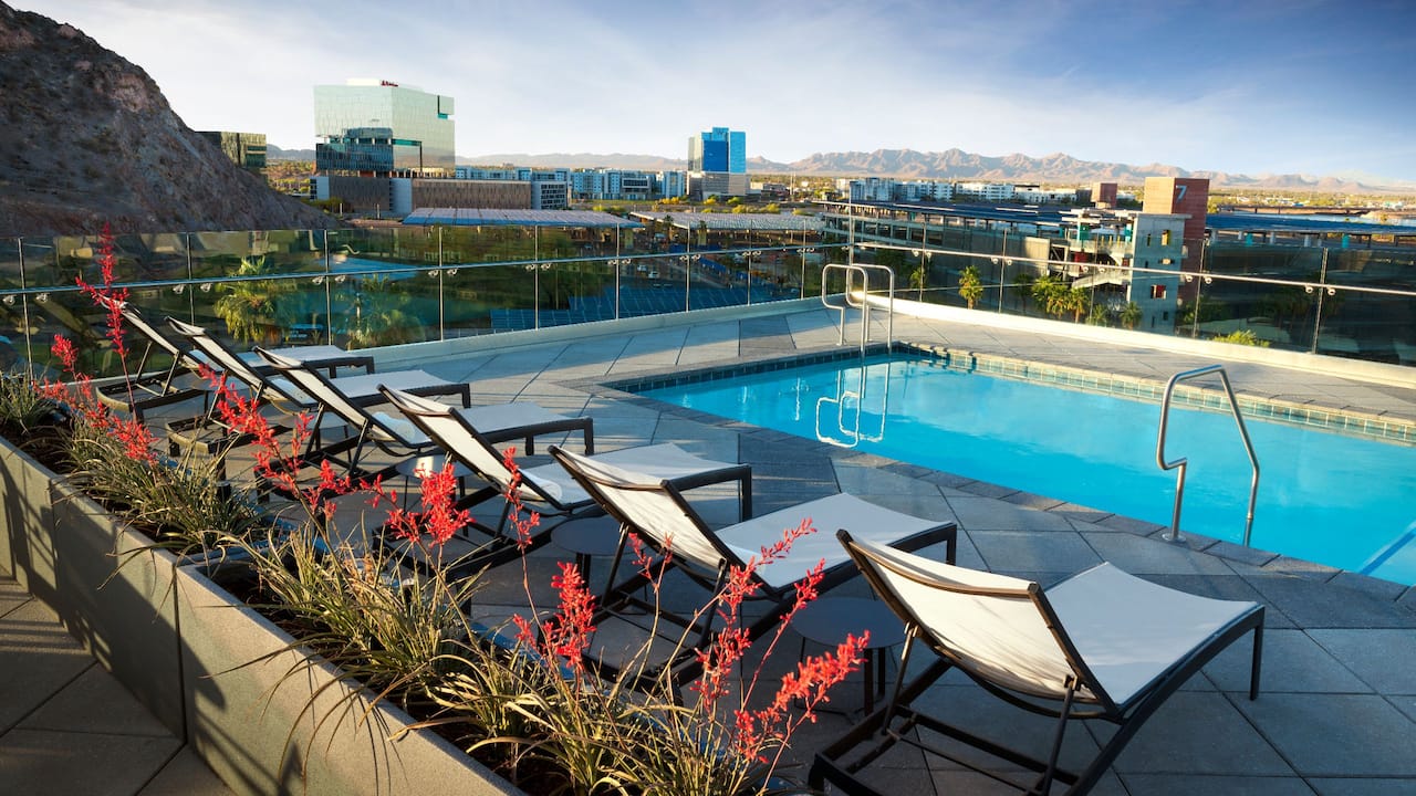 Rooftop Pool with Lounge Chairs Seating