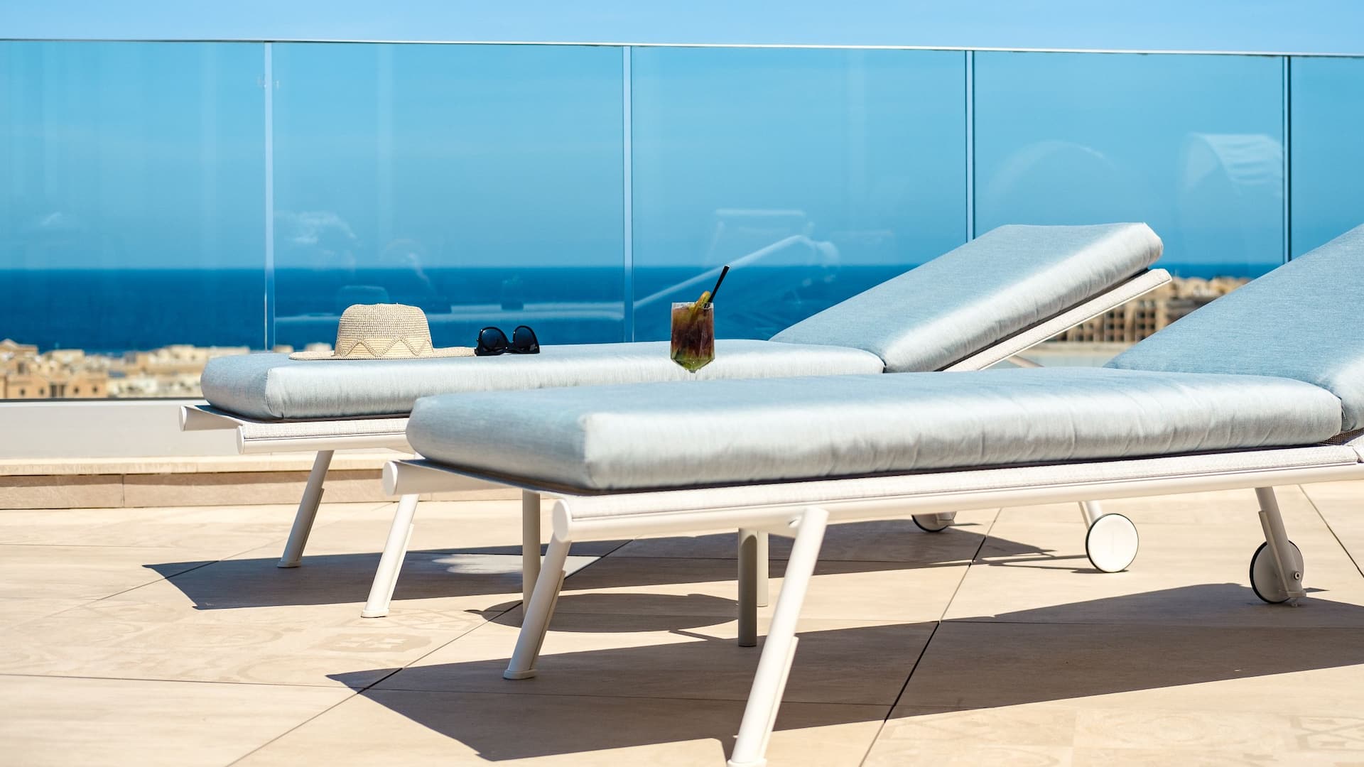 3 of 3 Hyatt Regency Malta Rooftop Pool Daytime View