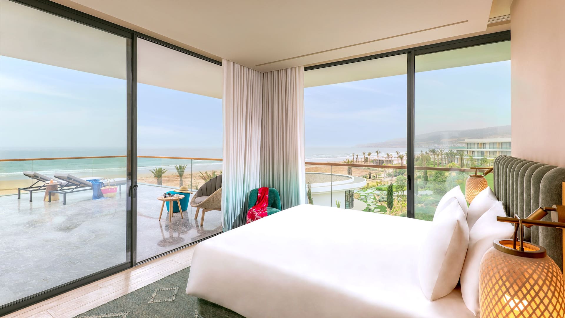 Room with a large terrace overlooking the sea, offering a breathtaking view