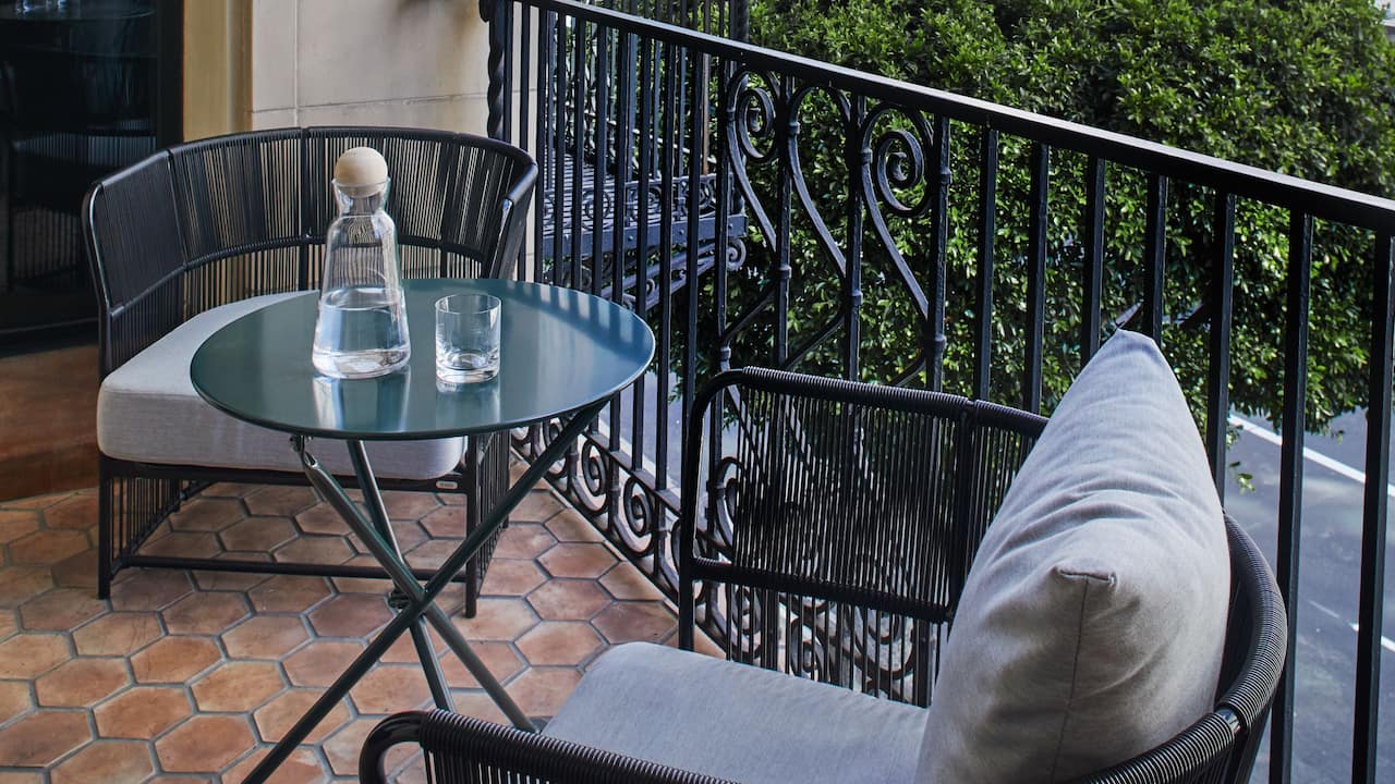 Figueroa Suite Balcony seating area with wrought-iron features