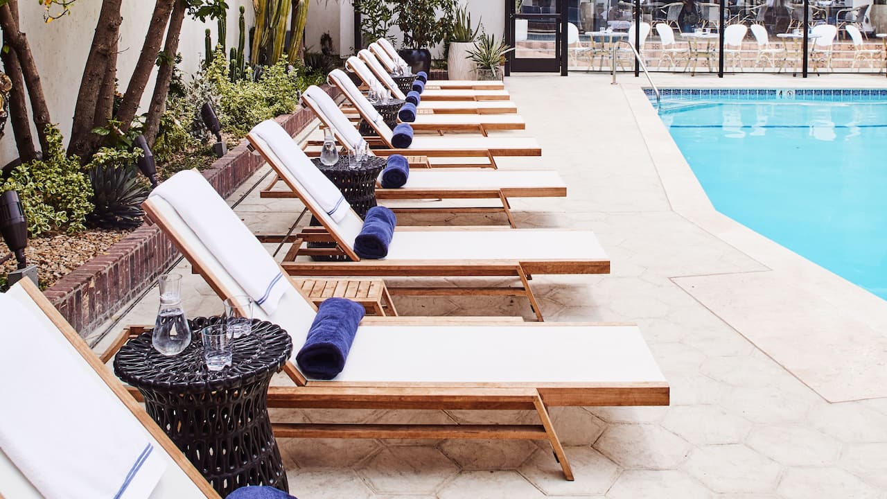 Poolside loungers with plush towels