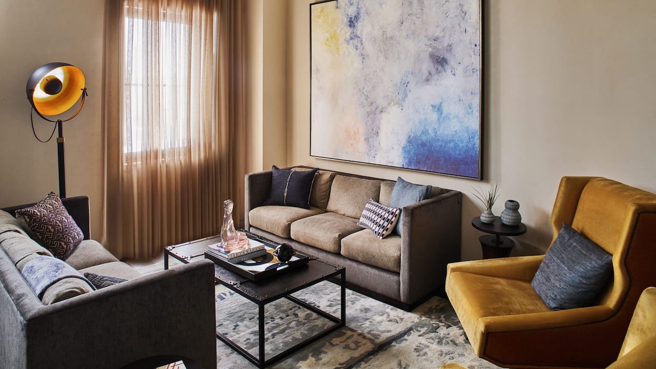 Event Suite living room seating and large artwork