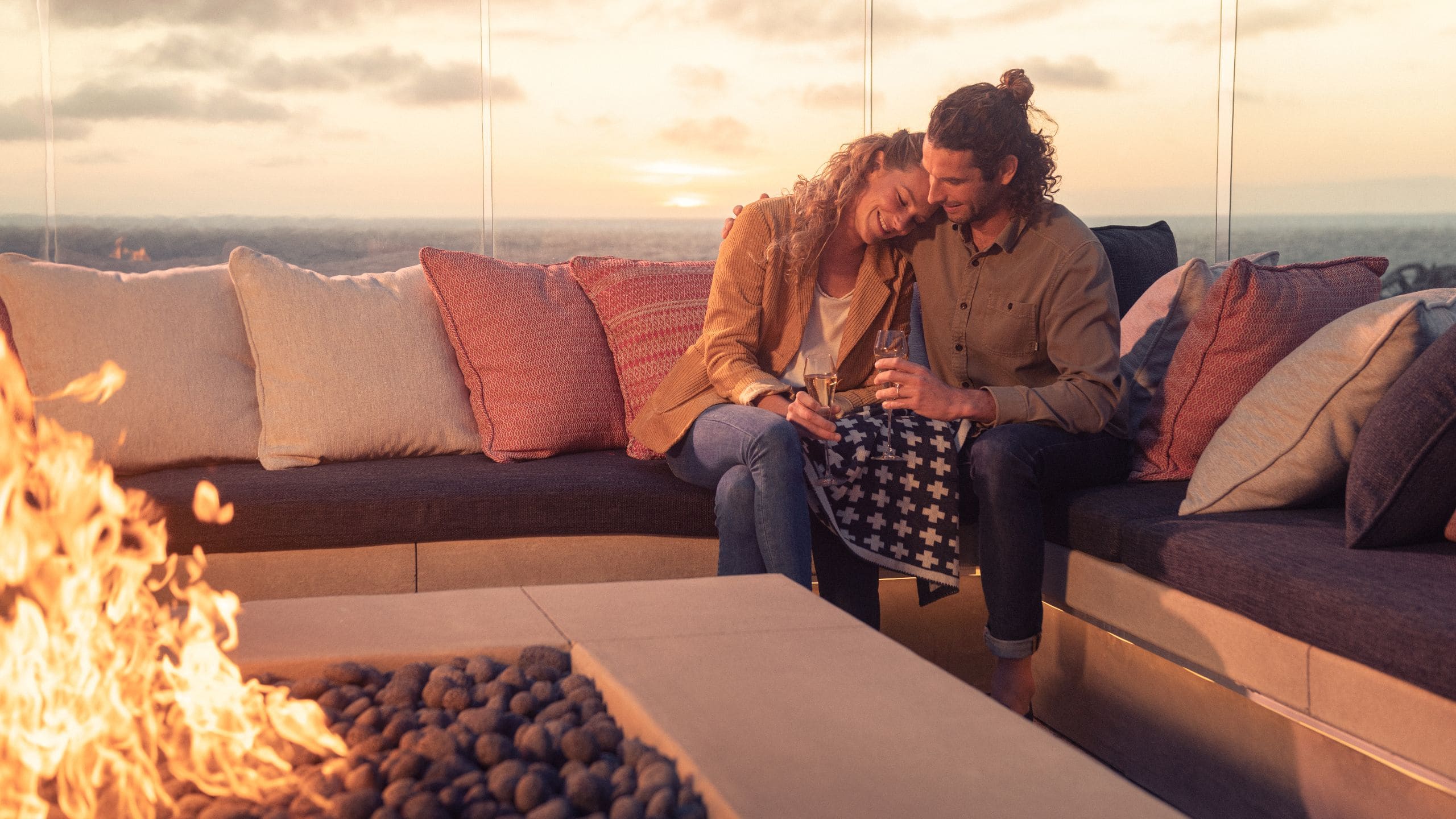 Alila Marea Beach Resort Encinitas Couple Couch Fireplace