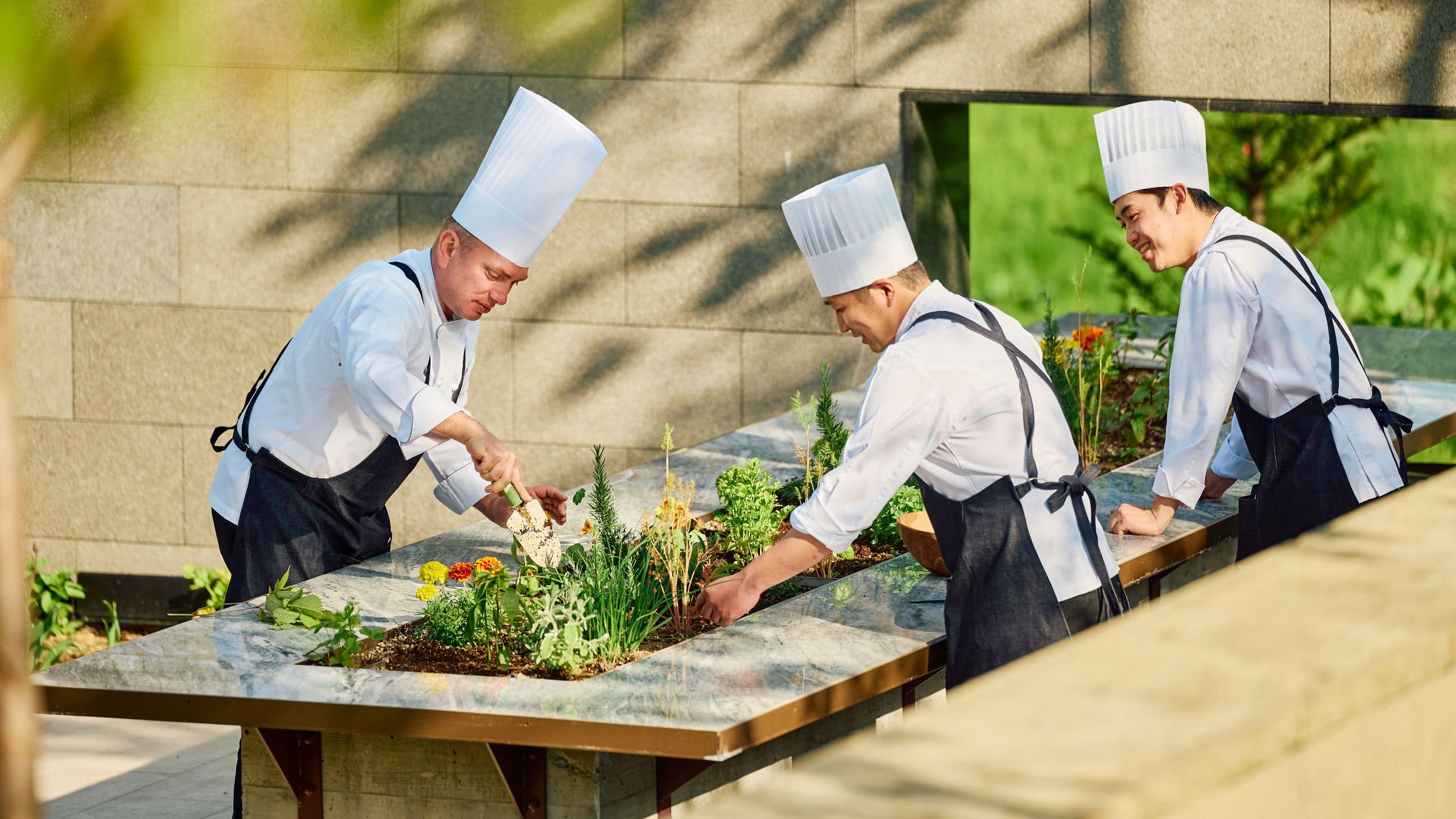 Park Hyatt Niseko Hanazono Chefs Garden With Chefs Close up