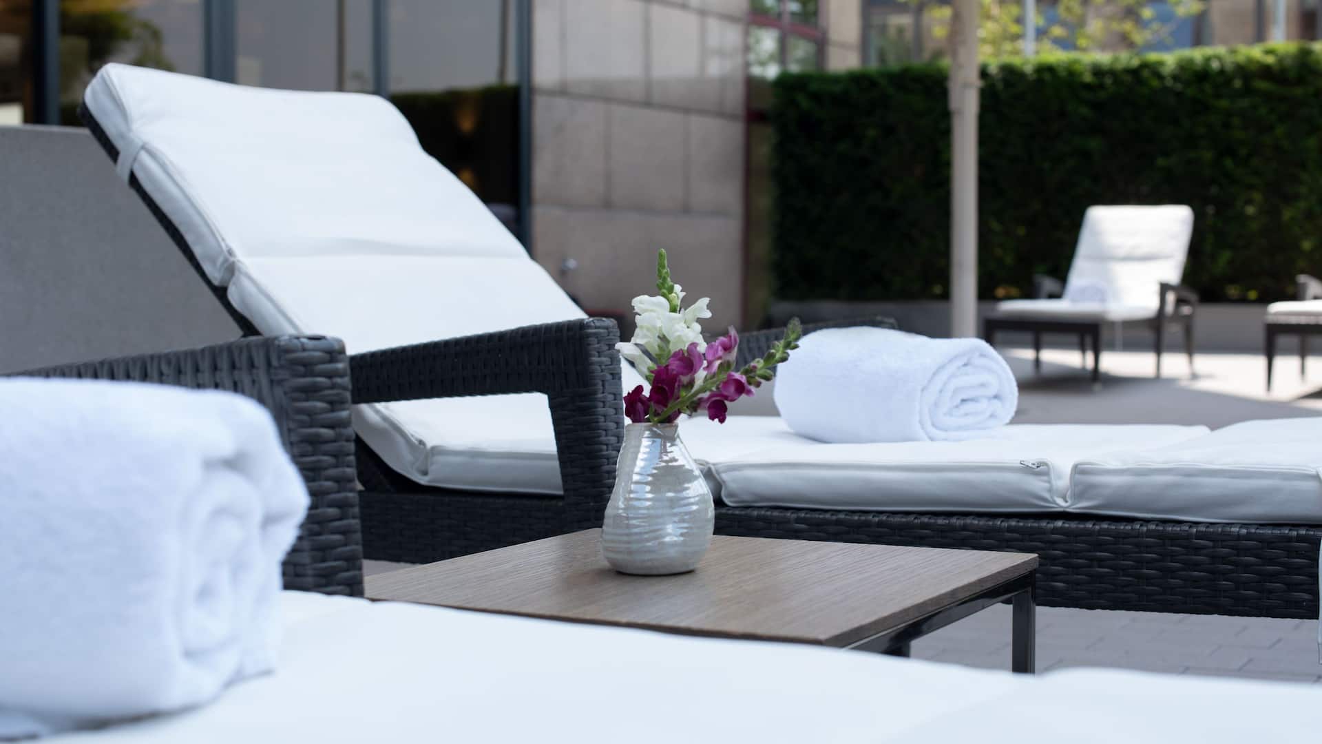 Loungers in the outdoor area of Puls Fitness Club at Hyatt Regency Cologne