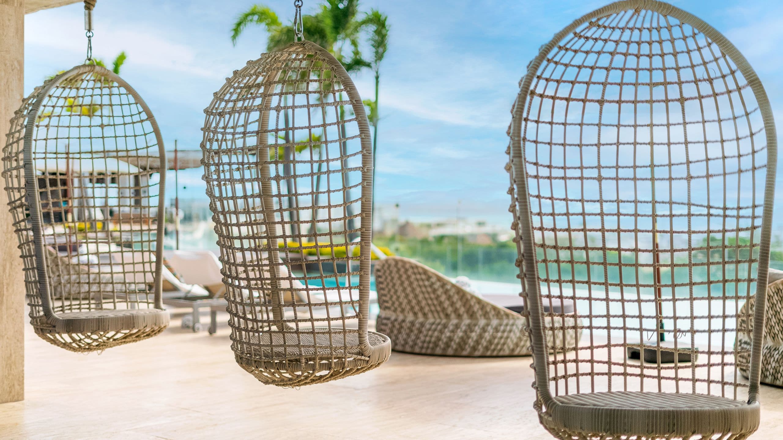 Thompson Playa del Carmen Main House Alessia Swing Chairs