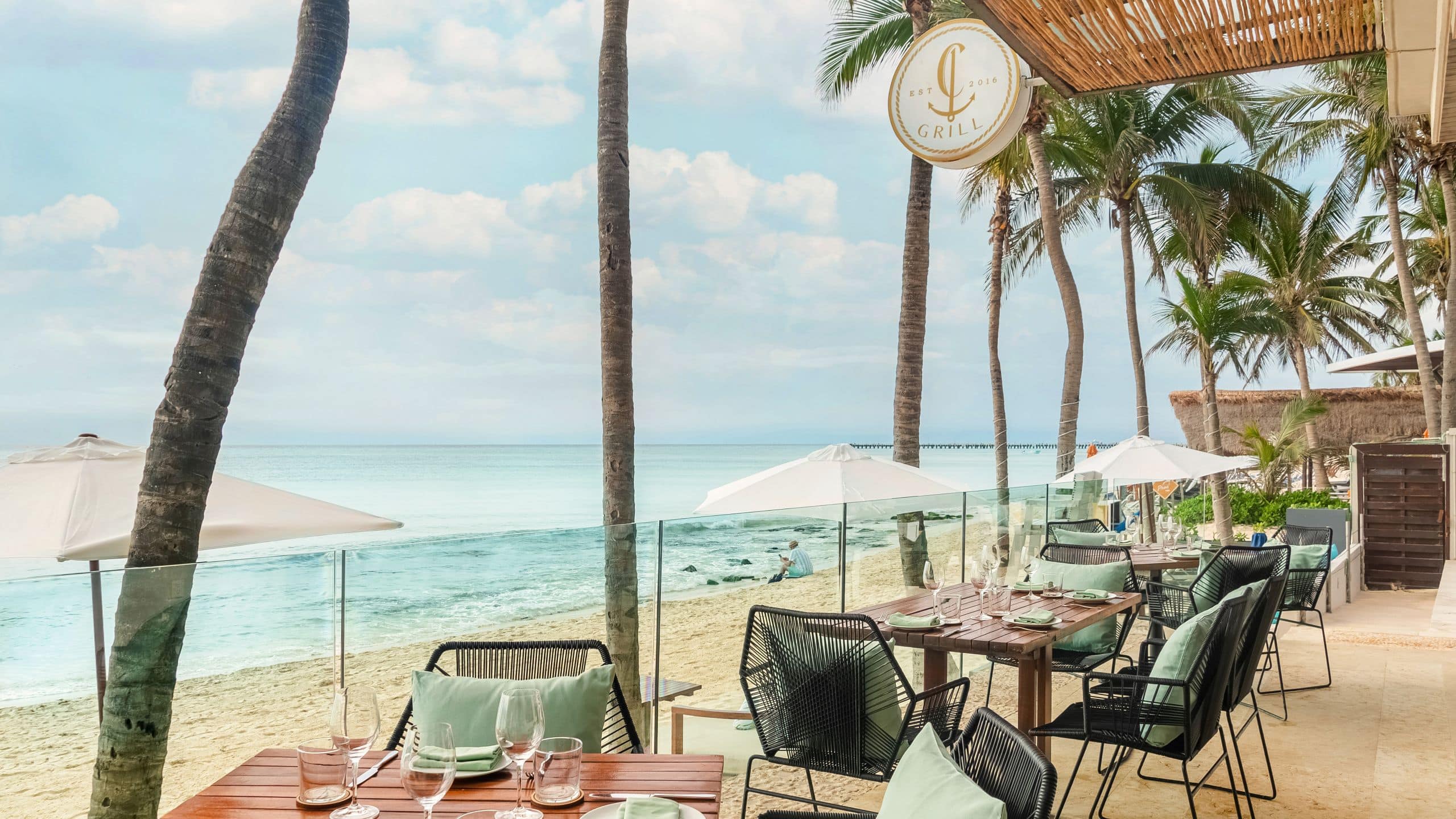 Thompson Playa del Carmen Main House CGrill Beachfront Tables Close up
