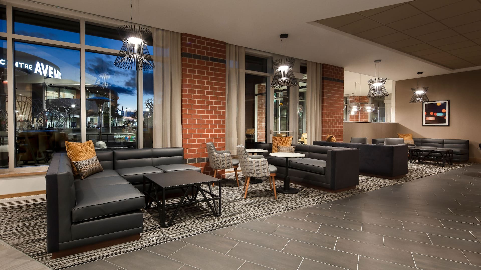 Hyatt Place Moncton / Downtown Bar Seating Evening View